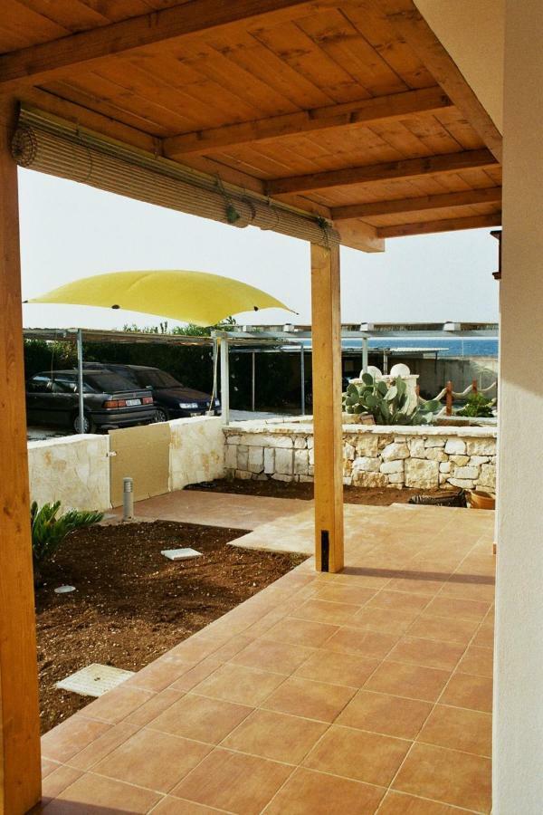 Апартаменты Casa Sullo Scoglio Вилланова-ди-Остуни Экстерьер фото